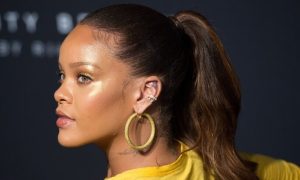The Latest Makeup Trends for this Spring Rihanna wearing gold highlighter