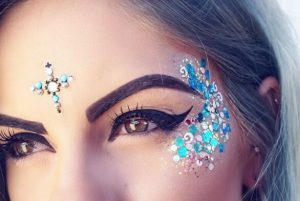 glitter sparkling makeup in blue colors with cut crease