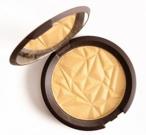 Becca Skin Perfector in Champagne Pop highlighter open package