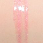 MAC Nicopanda Collection: Review & Swatches Mac Nicopanda Panda Kiss lip gloss swatch on skin