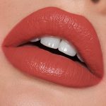 kylie kourt liquid lipstick minnie color on lips