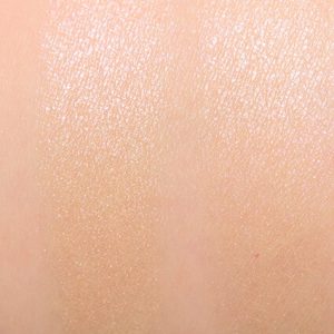 too faced starlight natural highlighter swatch on skin