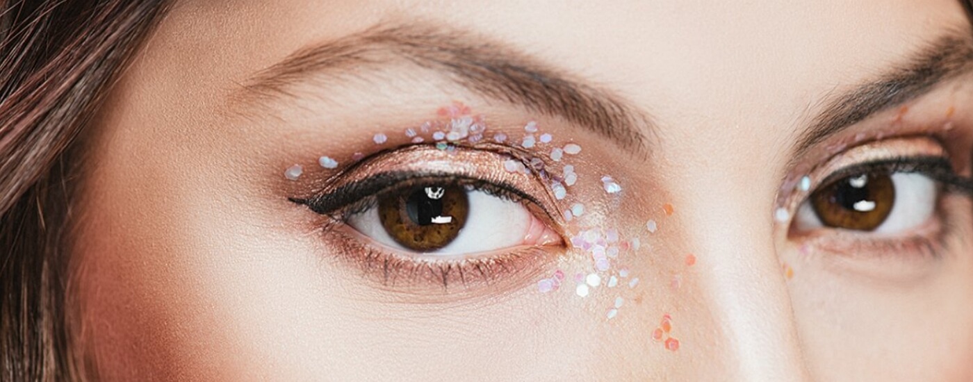 Woman with large amount of glitter eyeshadow applied
