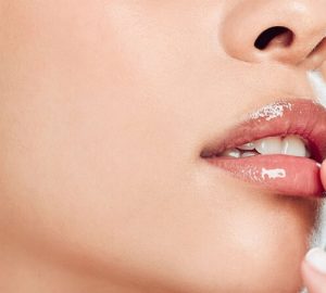 Lips with clear lip oil applied - lip oil vs lip gloss