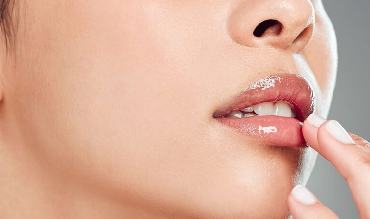 Lips with clear lip oil applied - lip oil vs lip gloss
