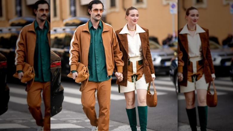Man and woman wearing brown and green
